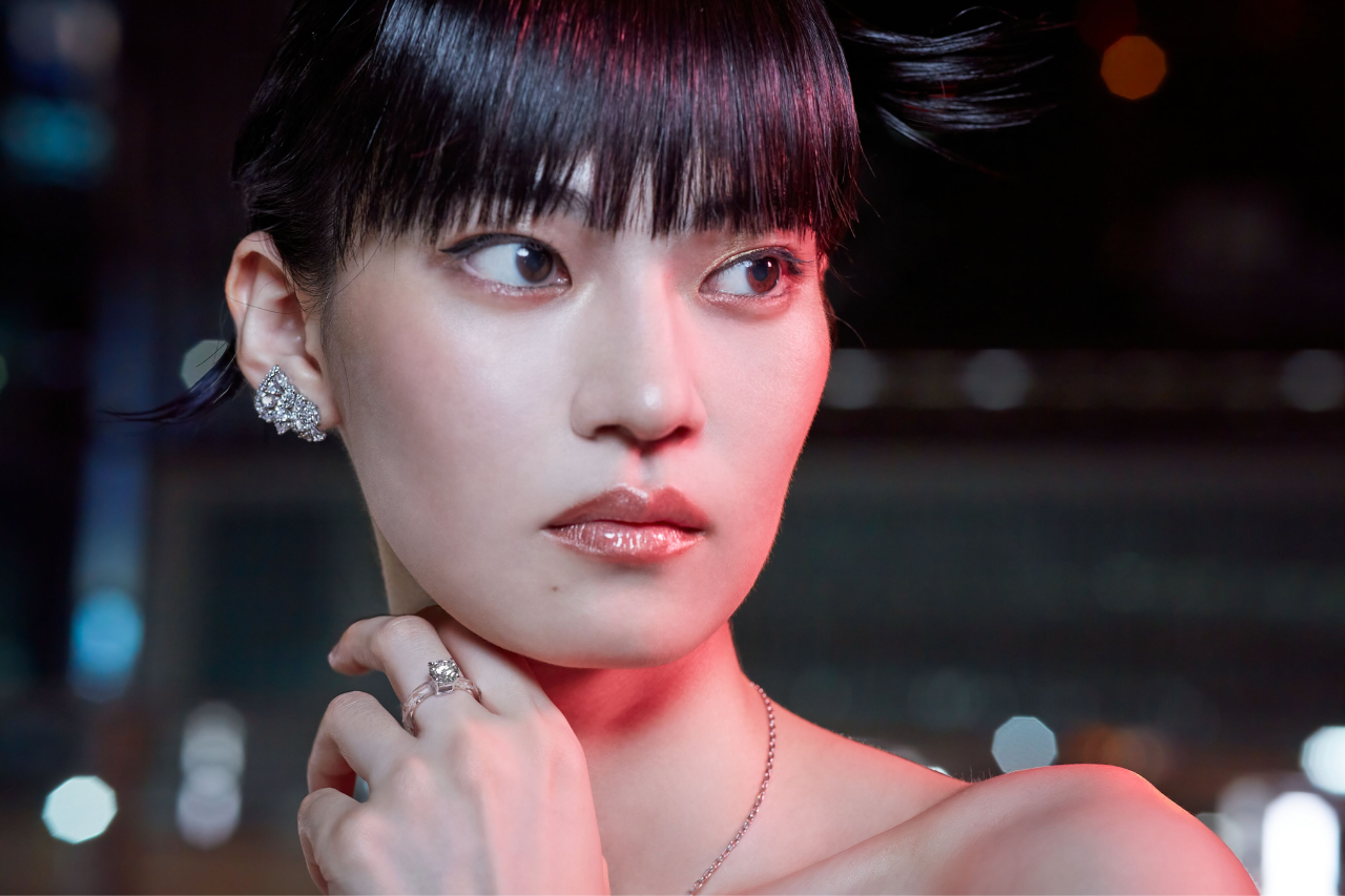 A woman wearing lab grown diamonds
