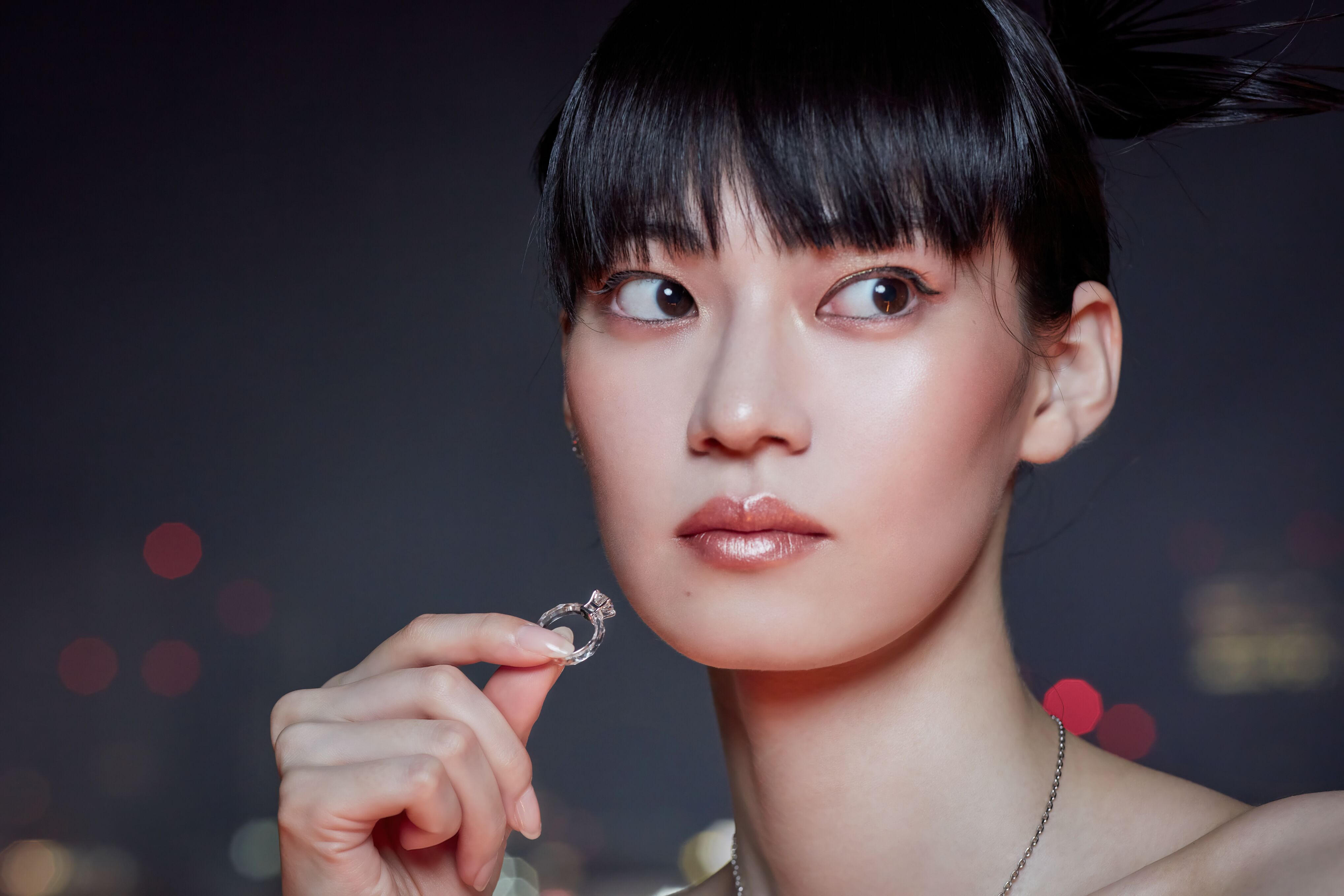 A woman wearing lab grown diamonds